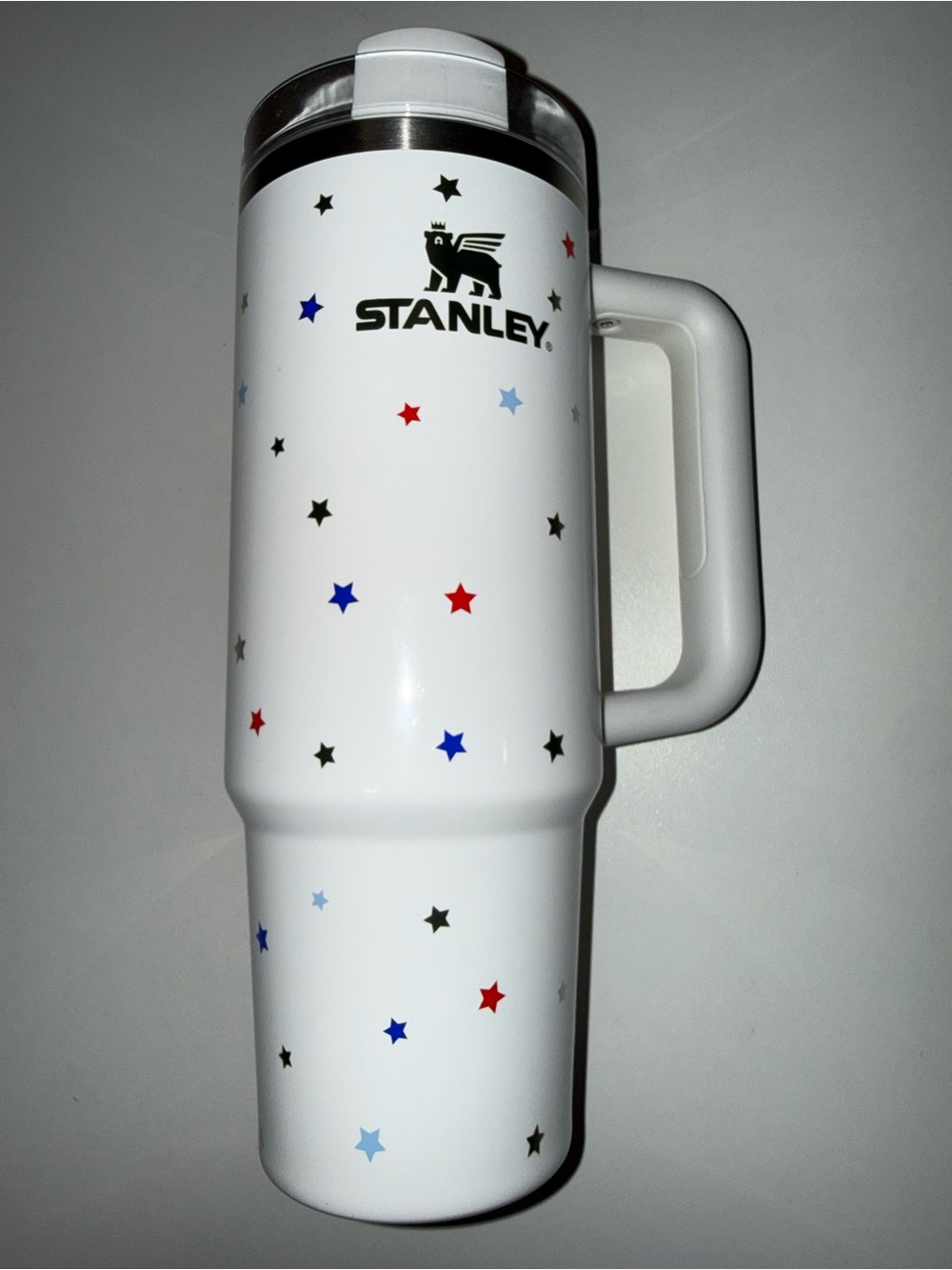 Stanley White Travel Tumbler with Multicolor Star Pattern and Handle